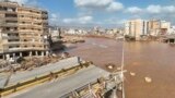 Vista geral da cidade líbia de Derna, a 12 de setembro de 2023, depois de a tempestade mediterrânica Daniel ter causado inundações devastadoras.
