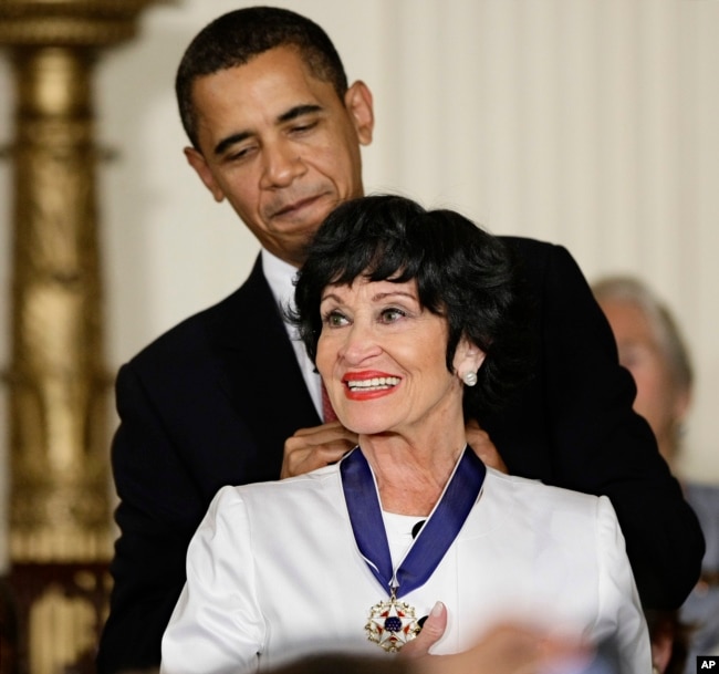 FILE - President Barack Obama presents the 2009 Presidential Medal of Freedom to Chita Rivera at the White House in Washington on Aug. 12, 2009. (AP Photo/J. Scott Applewhite, File)