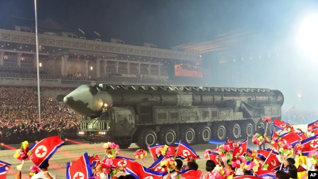 FILE -Photo by the North Korean government, shows what it says is a Hwasong-18 intercontinental ballistic missile during a military parade in Pyongyang, North Korea, July 27, 2023.