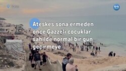 Ateşkes sona ermeden önce Gazzeli çocuklar sahilde normal bir gün geçirmeye çalıştı
