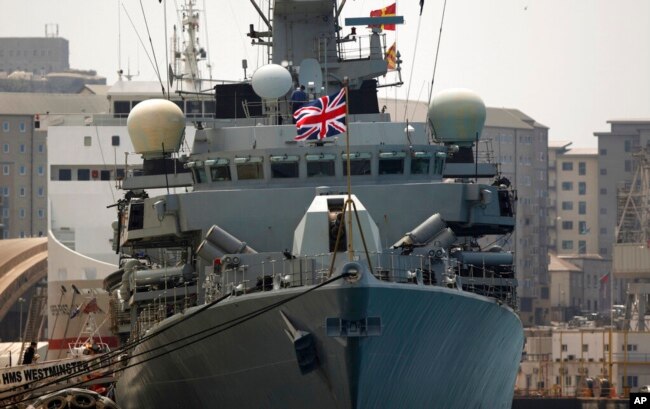 FILE - Britain's Royal Navy warship HMS Westminster sits docked in Gibraltar, Aug. 19, 2013.