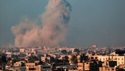 Smoke billows following Israeli bombardment in Rafah in the southern Gaza Strip on Feb. 25, 2024, during the ongoing conflict between Israel and the Palestinian Hamas militant group. 
