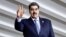 FILE - Venezuela's President Nicolas Maduro waves as he attends the South American Summit at Itamaraty Palace in Brasilia, Brazil, May 30, 2023.