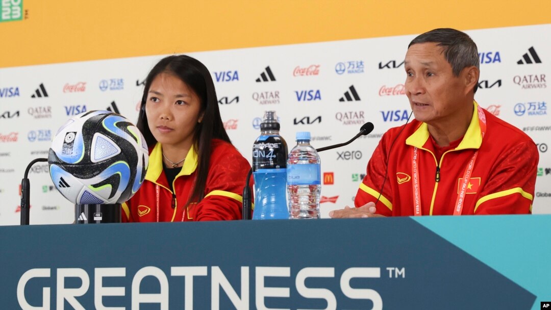 Vietnam captain Huynh Nhu and team coach Mai Duc Chung speak at a press conference a day ahead of the team's first match in the Women's World Cup in Auckland, New Zealand, July 21, 2023.