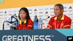 Vietnam captain Huynh Nhu and team coach Mai Duc Chung speak at a press conference a day ahead of the team's first match in the Women's World Cup in Auckland, New Zealand, July 21, 2023.