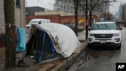 One of several tents for migrants remains outside of the Chicago Police Department 1st district station Dec. 1, 2023, in Chicago.