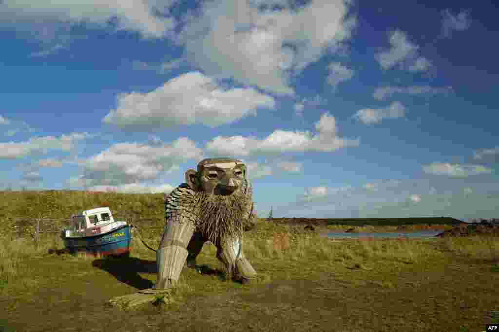 The &quot;troll&quot; statue &quot;Kaptajn Nalle&quot; by Danish recycling artist Thomas Dambo is pictured in Copenhagen, Denmark.