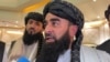 Zabihullah Mujahid, chief Taliban spokesperson, talks with reporters in Doha, Qatar, June 30, 2024.
