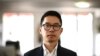 FILE - Hong Kong pro-democracy activist and former legislator Nathan Law poses during a photo session at the Reporters Sans Frontieres (RSF - Reporters Without Borders) headquarters in Paris on June 21, 2022. 