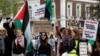 People demonstrate outside the Peace Palace in The Hague, Netherlands, in support of Palestinians on the day Nicaragua asked the International Court of Justice to order Berlin to halt military arms exports to Israel, April 8, 2024. 