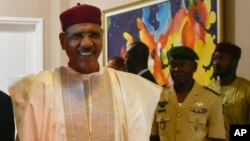 FILE - Niger President Mohamed Bazoum at the presidential palace in Niamey, Niger, March 16, 2023. 