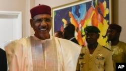 FILE - Niger President Mohamed Bazoum at the presidential palace in Niamey, Niger, March 16, 2023.