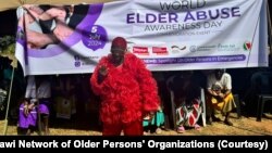 Jetu, wearing clothing designed by House of Xandria, poses during a World Elder Abuse Awareness Day event in Blantyre, Malawi, on July 5, 2024.