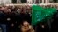 A young boy holds up a Hamas flag as people gather during a pro-Palestinian protest after Friday prayers outside Beyazit mosque in Istanbul, Nov. 24, 2023. 