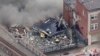 Tangkapan layar video yang dirilis oleh stasiun televisi WPVI-TV/6ABC tampak asap membubung dari ledakan di pabrik cokelat R.M. Palmer Co di West Reading, Pennsylvania, Jumat, 24 Maret 2023. (Foto: WPVI-TV/6ABC via AP)