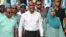 Maldives President Mohamed Muizzu (C) along with his supporters take part in an election campaign rally on the eve of the country's parliamentary election, in Male, April 20, 2024.