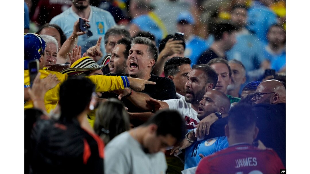 Uruguay's players argue with fans at the end of a Copa America semifinal soccer match against Colombia in Charlotte, NC, July 10, 2024.