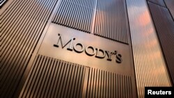 FILE — Signage is seen outside the Moody's Corporation headquarters in Manhattan, New York, U.S., November 12, 2021. 