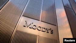 FILE - The Moody's Corporation headquarters in New York, Nov. 12, 2021.