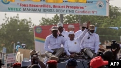 Chad's transitional incumbent president and presidential candidate for the party 'Coalition pour un Tchad Uni' General Mahamat Idriss Deby (C) waves to his supporters during the launch of his presidential campaign in N'Djamena, April 14, 2024.