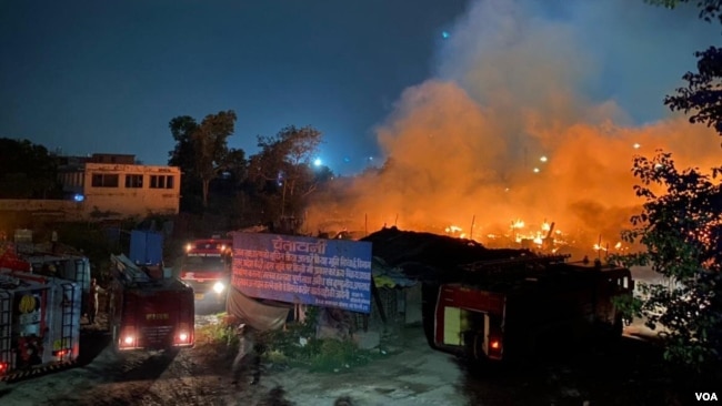 FILE - A fire broke out at a Rohingya colony in Madanpur Khadar area of Delhi on June 13, 2021. At least 55 plastic-thatched shanties were reduced to ashes by the fire. (Noor Kasem/VOA)