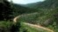 FILE - The Sonora River, contaminated by the spill of about 40 million liters  of copper sulfate and heavy metals from the Buenavista copper mine, makes its way through the hills in the northern state of Sonora, Mexico, Aug. 12, 2014. 