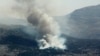 Smoke billows from forest fires near the southern Lebanese village of Shebaa, near the northern border of Israel, following the shooting down of a drone by the Israeli army on July 4, 2024.