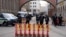 Security officers stand near a roadblock prior to arrivals for the Munich Security Conference at the Bayerischer Hof Hotel in Munich, Germany, Feb. 16, 2024. 