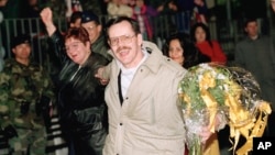 FILE - Journalist Terry Anderson smiles upon his arrival at the Wiesbaden Air Force hospital in Germany, Dec. 5, 1991, a day after being released by his abductors in Beirut, where he was held captive for almost seven years. Anderson died April 21, 2024, at age 76. 