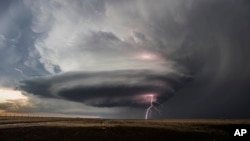 This May 21, 2020, photo provided by Victor Gensini shows a tornado in Moscow, Kan. (Victor Gensini via AP)