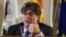 FILE - Catalonia's then-leader Carles Puigdemont speaks at a press conference in Alghero, Italy, Oct. 4, 2021. 
