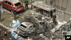 A car is seen damaged after Russian missile strikes on Okhmatdyt Children's Hospital in Kyiv, Ukraine, July 8, 2024.