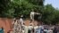 FILE - Nigerian security forces prepare to disperse pro-junta demonstrators gathered outside the French embassy, in Niamey, the capital city of Niger July 30, 2023. 