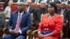 FILE - Haitian President Jovenel Moise, left, sits with his wife Martine during his swearing-in ceremony at Parliament in Port-au-Prince, Haiti, Feb. 7, 2017. Jovenel Moise was killed on July 7, 2021.