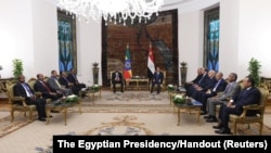 Egyptian President Abdel Fattah al-Sisi meets with Ethiopian Prime Minister Abiy Ahmed to discuss Sudan's crisis and an Ethiopian dam, at the Ittihadiya presidential palace in Cairo, July 13, 2023.