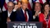 Republican presidential candidate former President Donald Trump gestures while speaking at a primary election night party at the South Carolina State Fairgrounds in Columbia, South Carolina, Feb. 24, 2024.