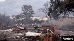A view of damage by wildfires in Grebastica, Croatia.