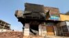 FILE - A view shows a damaged building as clashes between the army and the paramilitary Rapid Support Forces (RSF) continue, in Omdurman, Sudan July 4, 2023. 