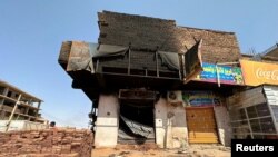 FILE - A view shows a damaged building as clashes between the army and the paramilitary Rapid Support Forces (RSF) continue, in Omdurman, Sudan July 4, 2023. 