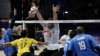 Iran's Morteza Mehrzadselakjani blocks the ball during the preliminary sitting volleyball match against Brazil during the Paralympic Games in Paris, Sept. 1, 2024.