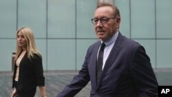 FILE - Actor Kevin Spacey, right, arrives at the Southwark Crown Court after lunch break in London, Britain, July 14, 2023. 