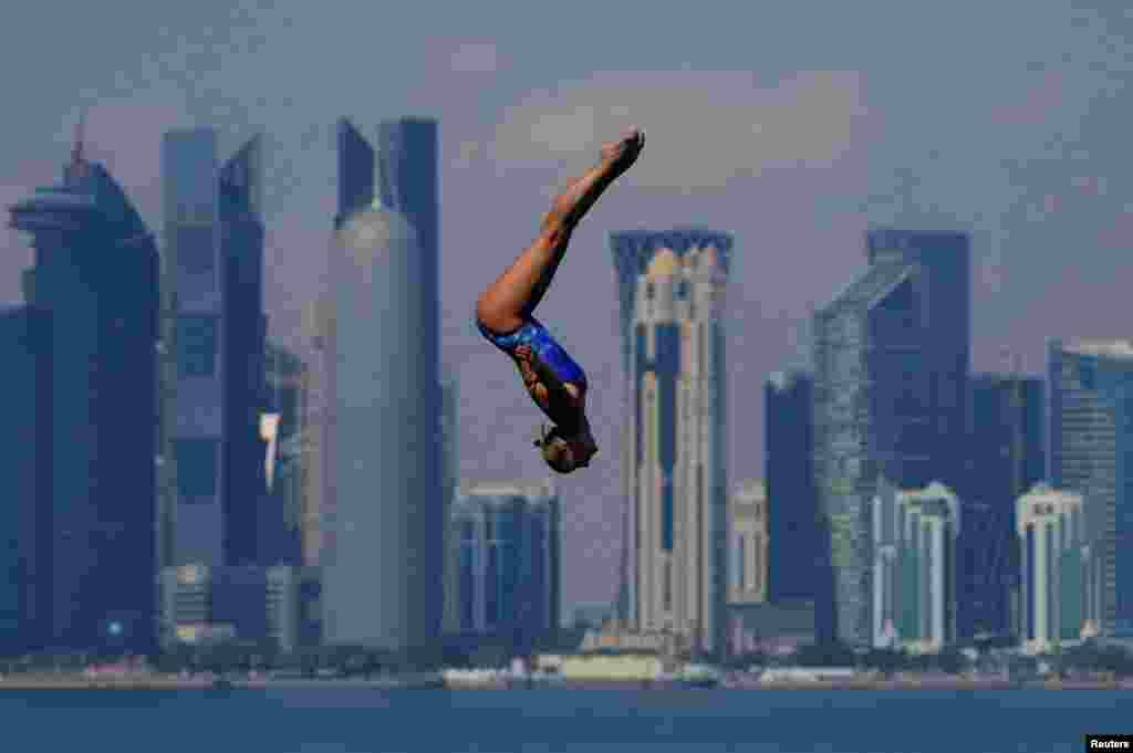 Australia&#39;s Rhiannan Iffland competes in the women&#39;s 20m round high diving event during the World Aquatics Championships in Doha, Qatar.