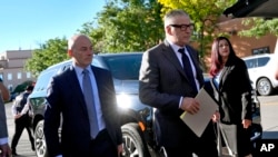 Actor Alec Baldwin, right, and attorney Luke Nikas, arrive for jury selection in his involuntary manslaughter trial, July 9, 2024, in Santa Fe, New Mexico. 