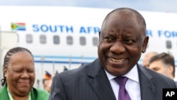 South Africa's President Cyril Ramaphosa, right, and Foreign Minister Naledi Pandort arrive at Pulkovo International Airport to participate in the Russia-Africa Summit in St. Petersburg, July 26, 2023.