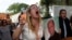 A niece of slain activist Adolfo Enriquez Vanderkam shouts asking for justice, at his funeral in Leon, Guanajuato state, Mexico, Nov. 23, 2023. 