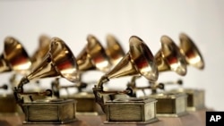 FILE - Grammy Awards are displayed at the Grammy Museum Experience at Prudential Center in Newark, NJ on Oct. 10, 2017. 