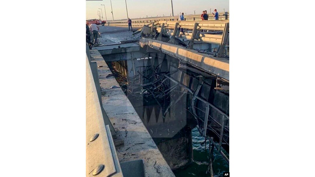 This photo released by Ostorozhno Novosti on July 17, 2023, reportedly shows damaged parts of an automobile link of the Crimean Bridge connecting Russian mainland and Crimean peninsula over the Kerch Strait not far from Kerch, Crimea.