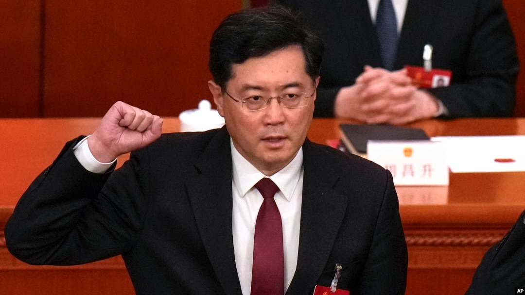 FILE - Then-newly elected Chinese Foreign Minister Qin Gang takes his oath at the Great Hall of the People in Beijing on March 12, 2023. China on July 25, 2023, removed Qin from office and replaced him with his predecessor, Wang Yi.