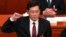 FILE - Then-newly elected Chinese Foreign Minister Qin Gang takes his oath at the Great Hall of the People in Beijing on March 12, 2023. China on July 25, 2023 removed Qin from office and replaced him with his predecessor, Wang Yi.