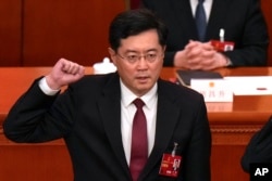 FILE - Then-newly elected Chinese Foreign Minister Qin Gang takes his oath at the Great Hall of the People in Beijing on March 12, 2023. China on July 25, 2023 removed Qin from office.